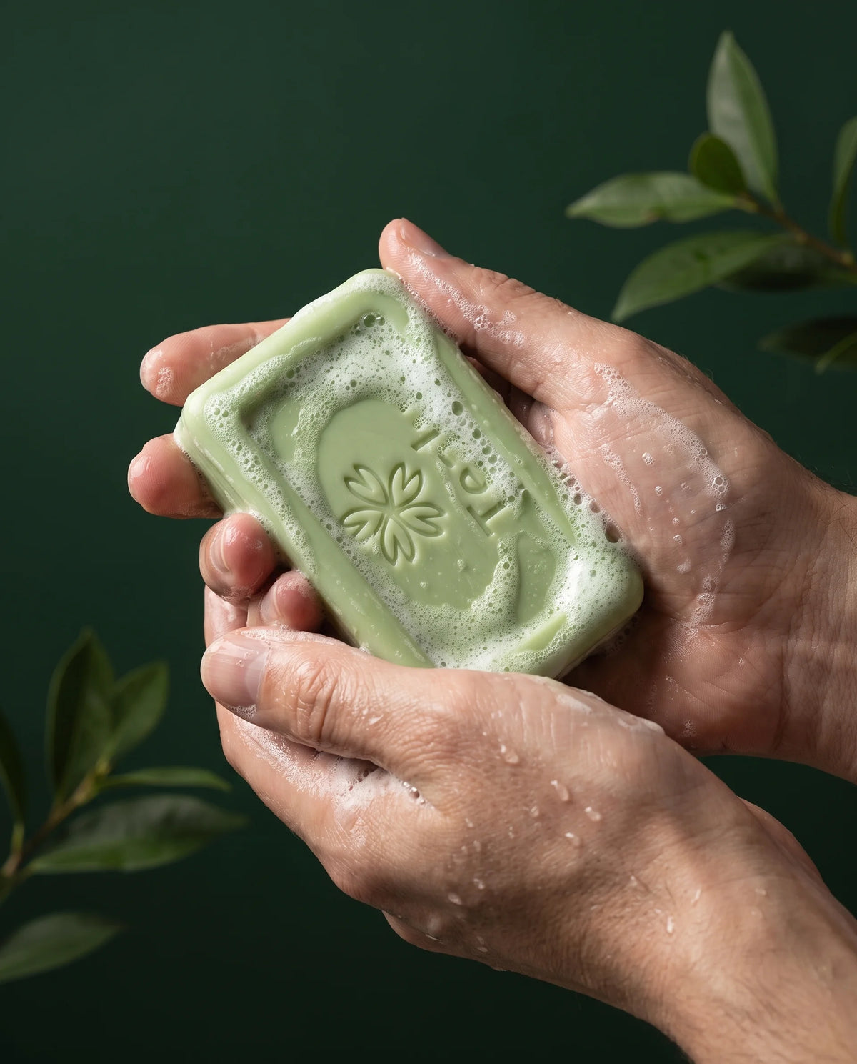 Person washing with Tealu tea tree soap in the shower
